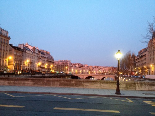 A rosy hue on the buildings facing the other direction