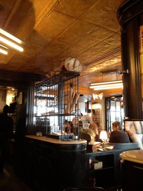 Notice the Poilane bread on top of the shelf!