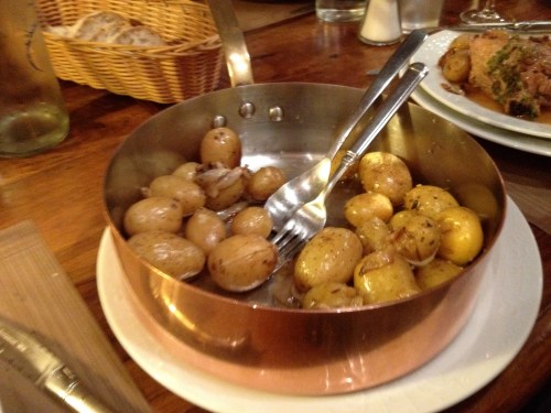 potatoes ini a gorgeous copper skillet accompanied our entrees