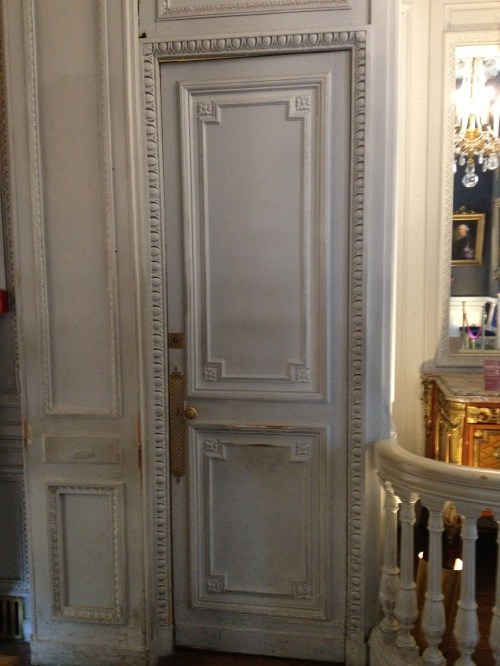 This pretty door was in her first bedroom, before she changed rooms to be closer to her husband's room.