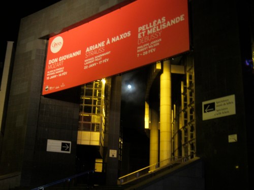 The moon shown down on us through the Bastille Opera.