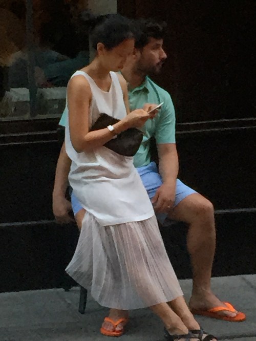 This couple was also waiting and I thought she was so chic. He- not so much.