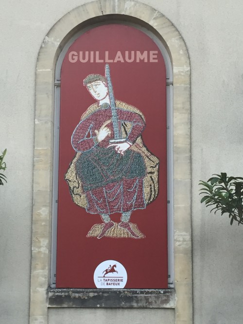 This sign in Bayeux provides an example of the tapestry images.